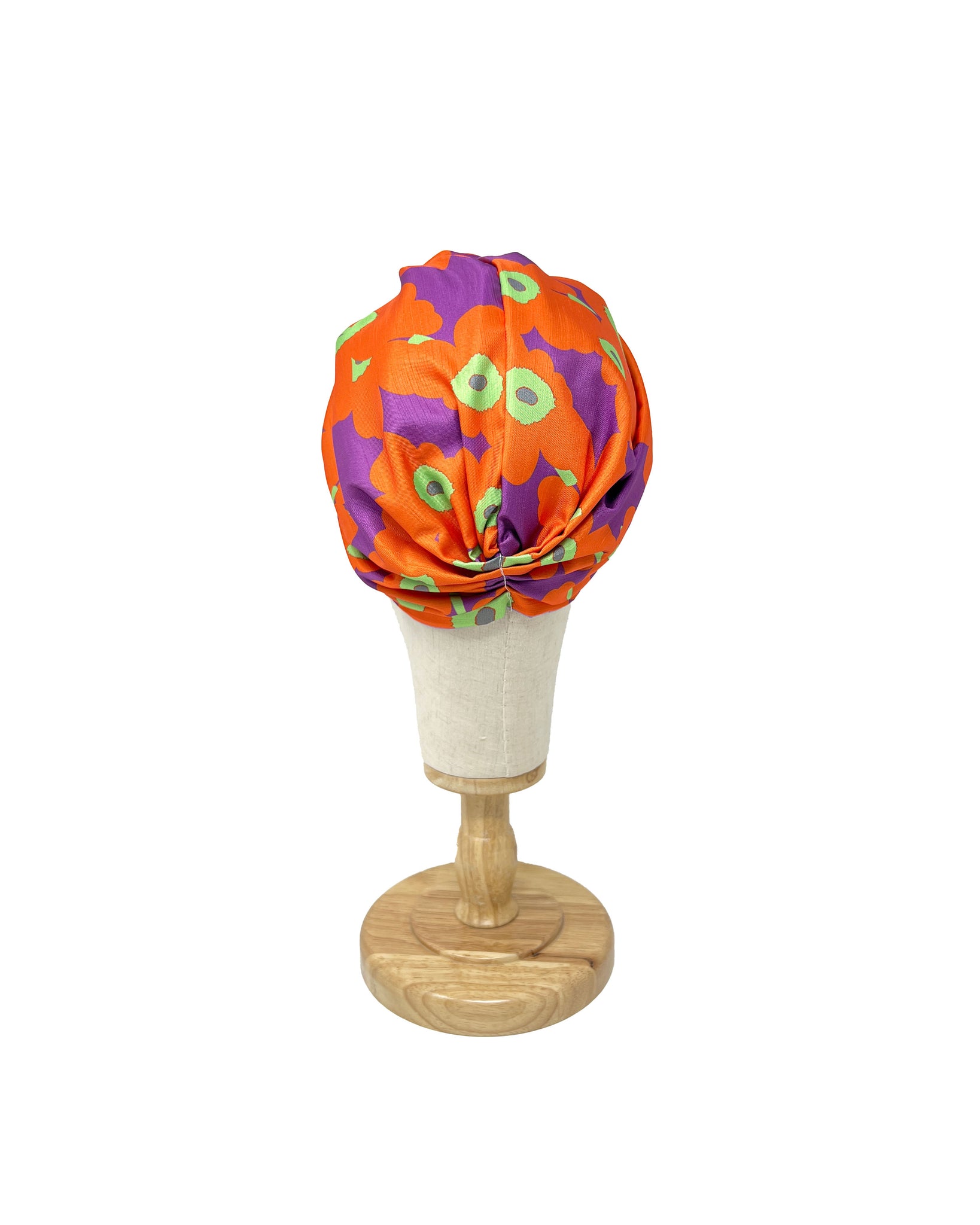 Purple shantung turban with orange flower pattern