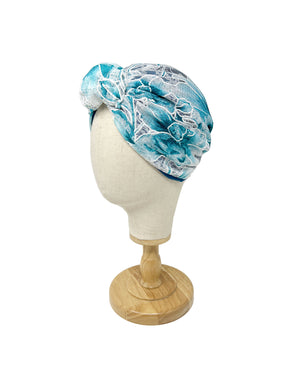 White lace turban with blue floral pattern